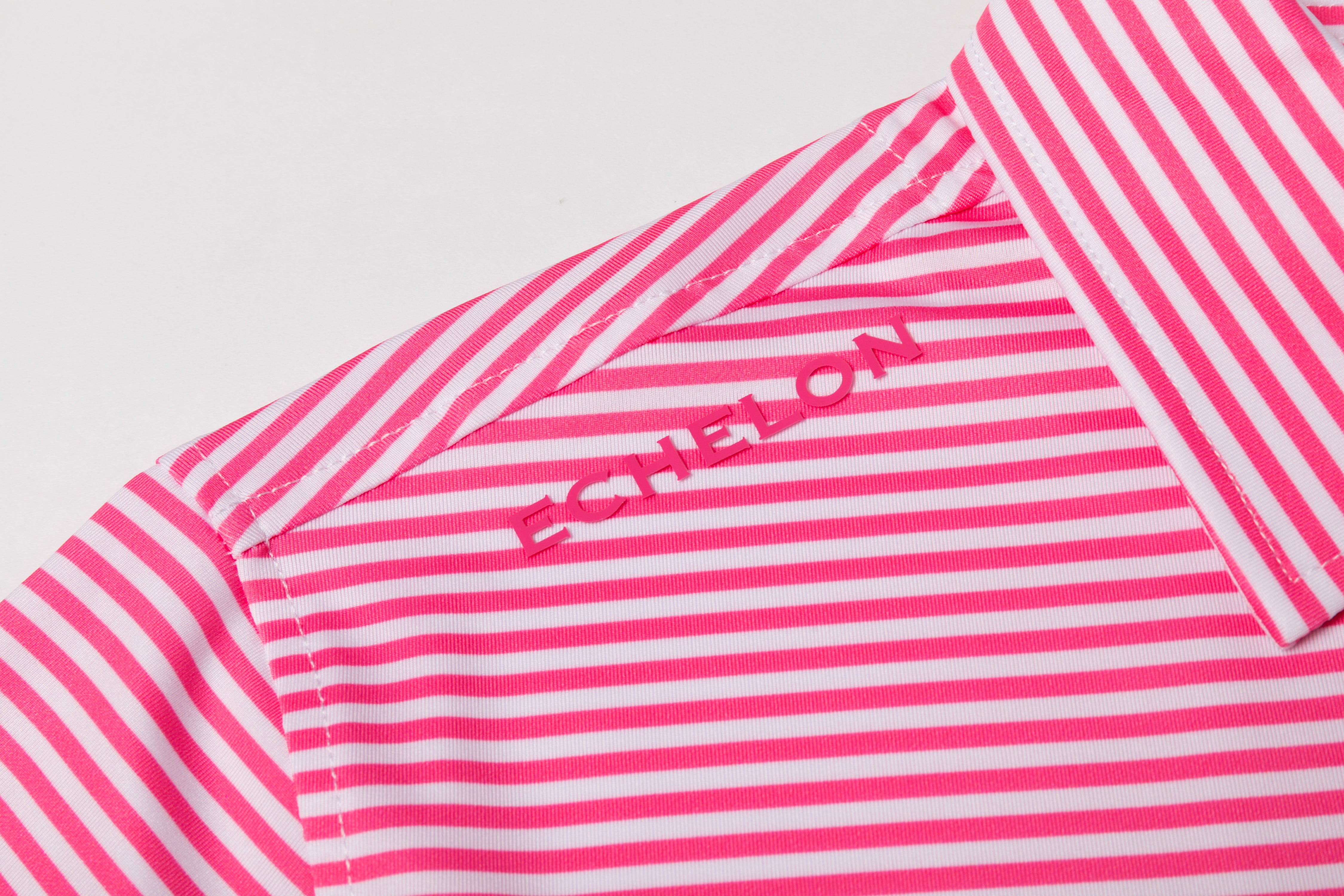 The Catalyst – Men’s Pink & White Striped Golf Polo