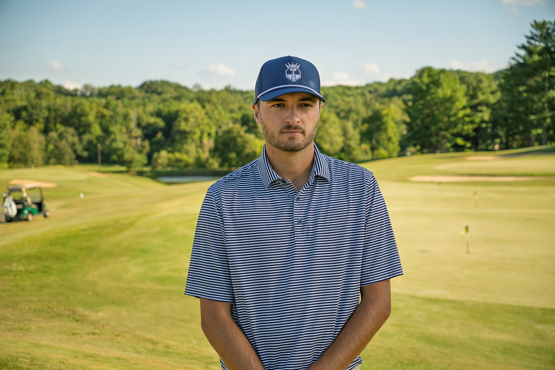 Stripe Show – Men’s Navy & White Striped Golf Polo